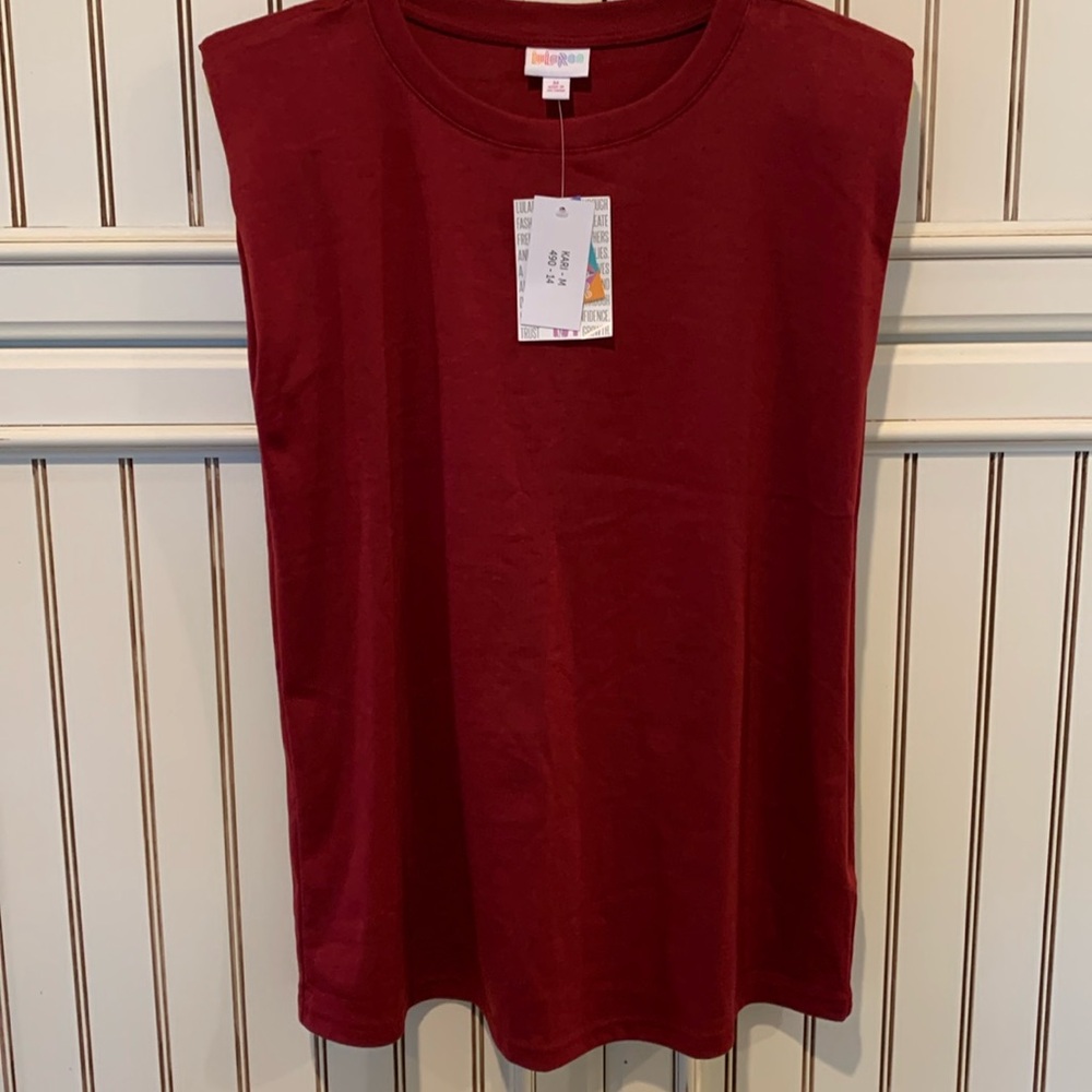 LuLaRoe Kari. Brand new with tags burgundy. Has removable shoulder pads